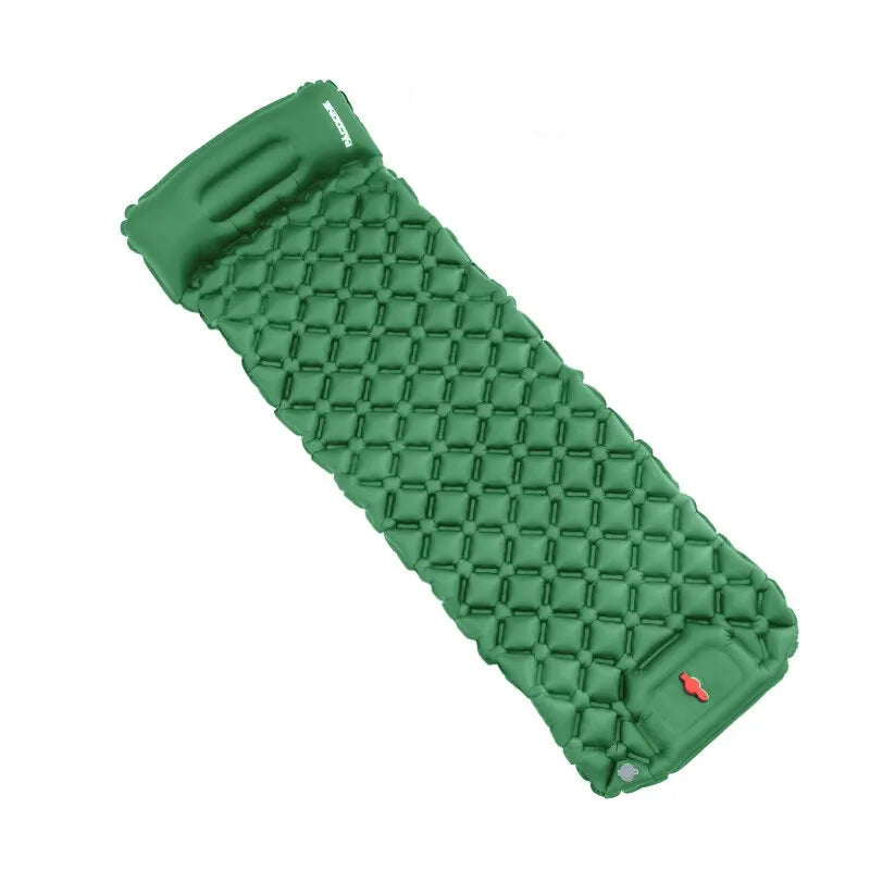 Green inflatable camping mattress with packaging on a white background