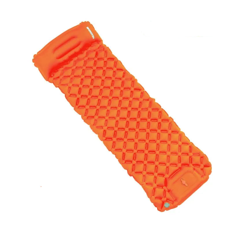 Orange inflatable sleeping pad on a white background