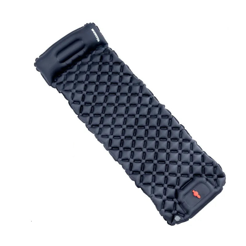 Navy inflatable sleeping pad with carrying case on a white background