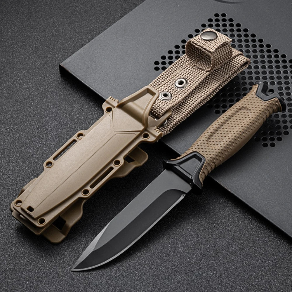 Tactical camping knife with brown sheath on a dark surface