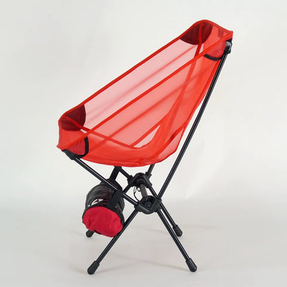 570g ultralight camping chair in red folded with carry bag